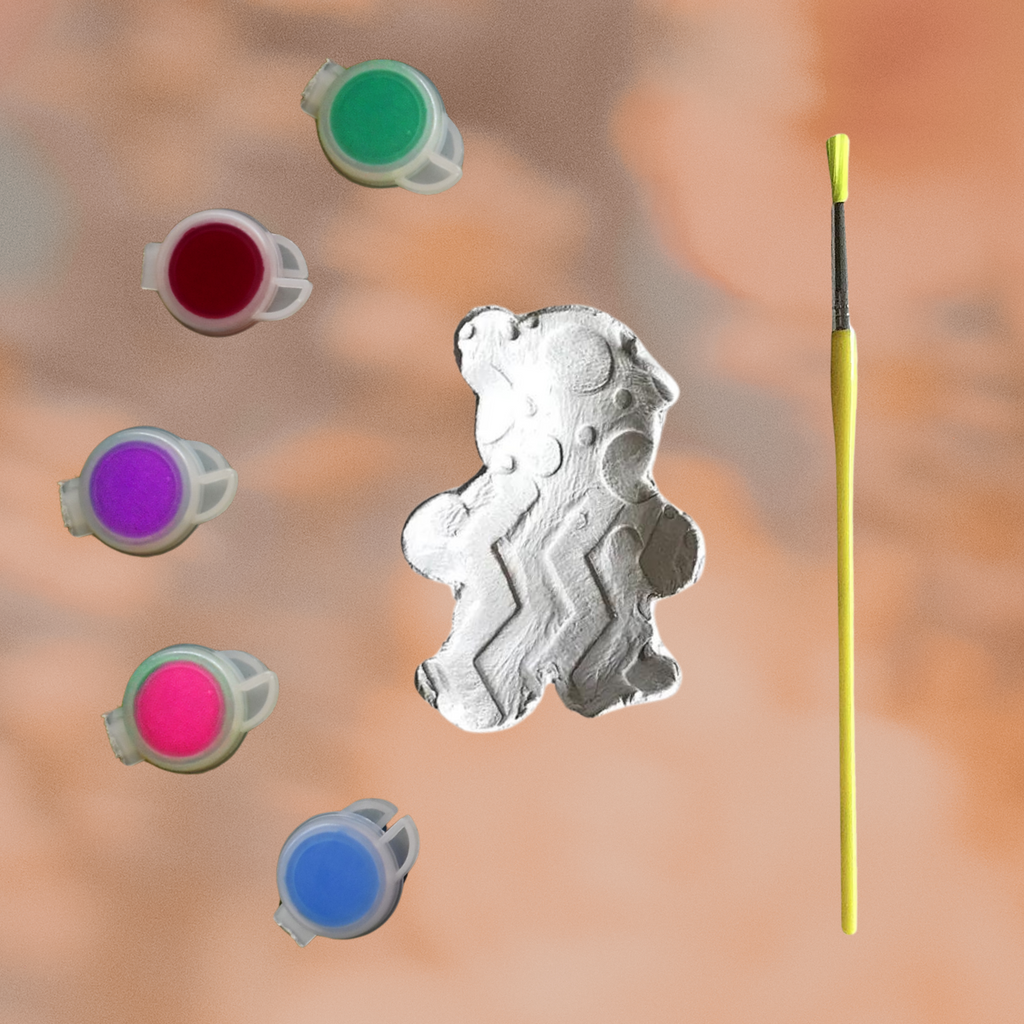 Teddy Paint By Numbers Kit featuring a gray teddy bear figure, five paint pots in bright colors, and a yellow paintbrush.