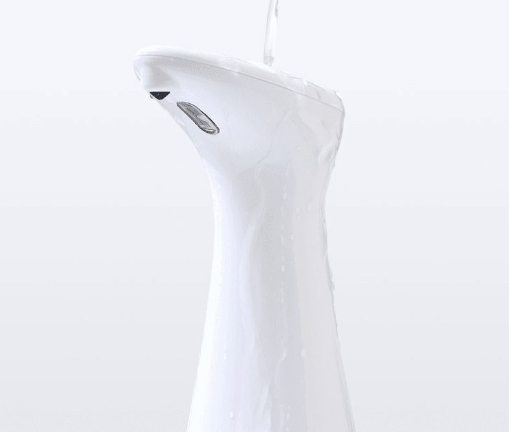 Touchless automatic induction soap dispenser in sleek white design, featuring an infrared sensor for hands-free use.