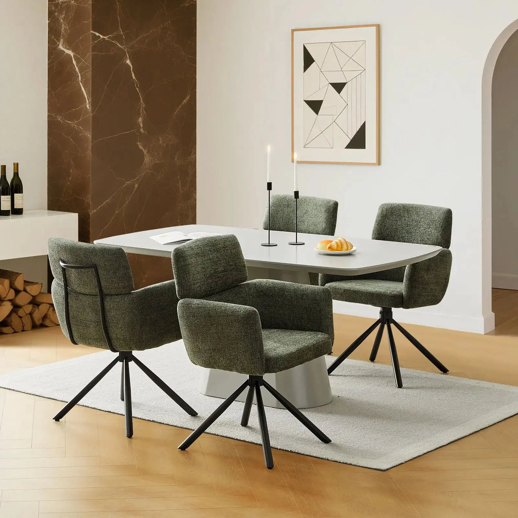 Contemporary smoky grey chenille swivel chair with a metal base, set around a modern dining table.
