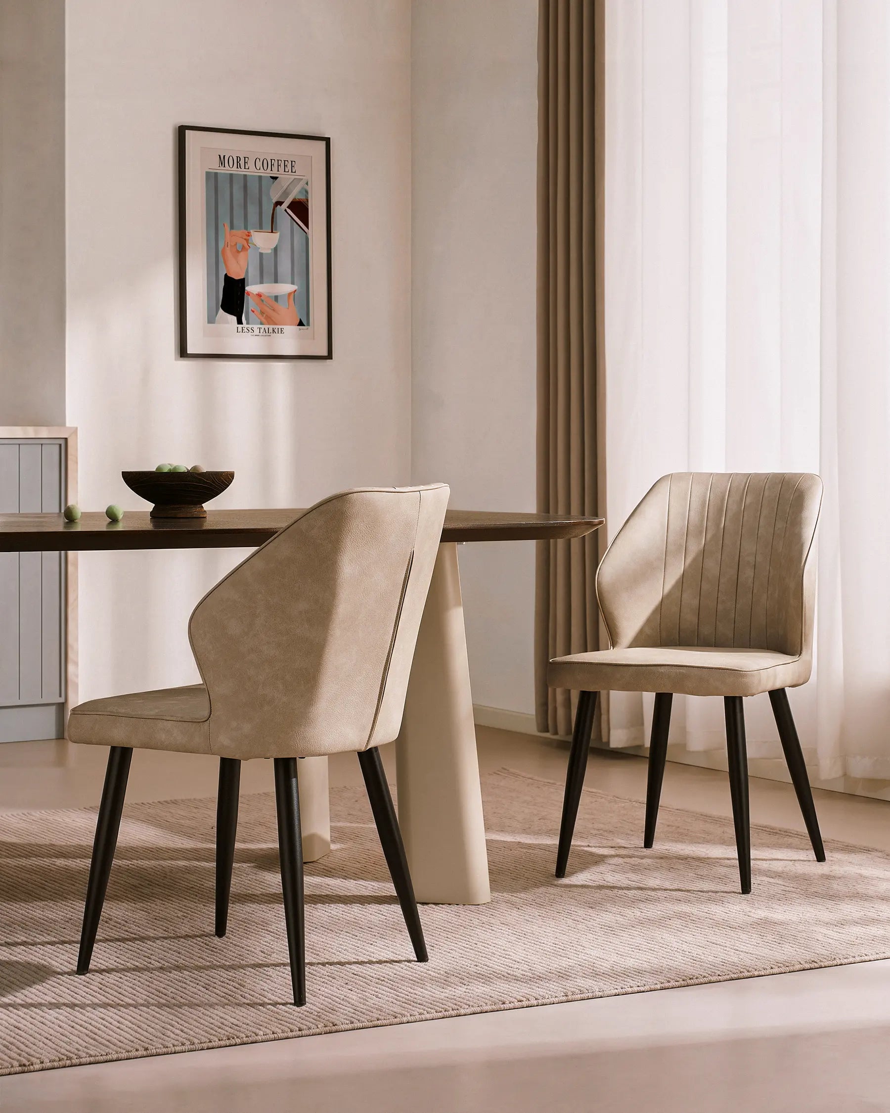 Set of 6 beige faux leather dining chairs with black metal legs, featuring a stylish design and soft upholstery.