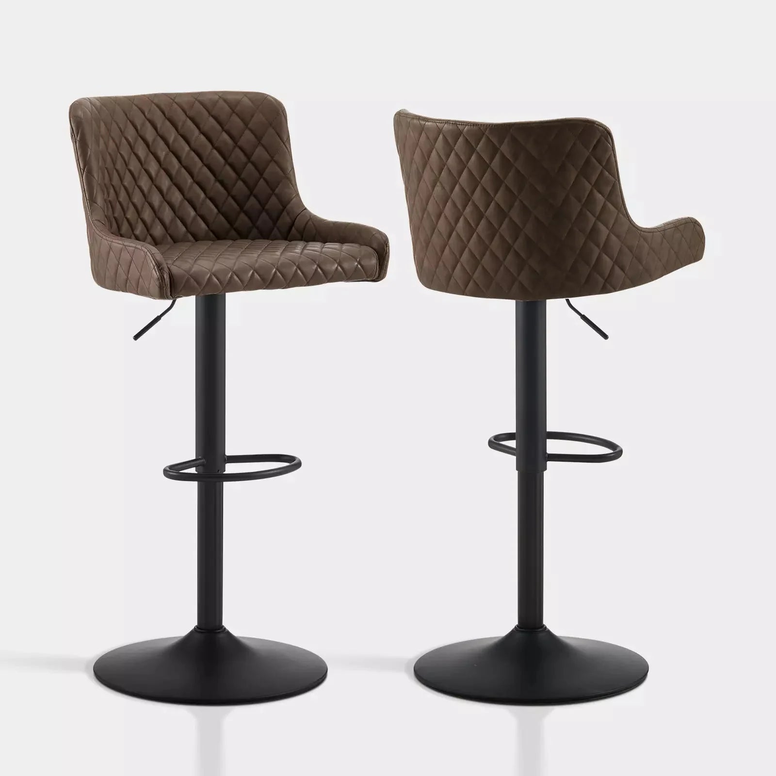 Height-adjustable Dundas bar stools in brown faux leather with quilted pattern and black metal base, sold as a set of two.