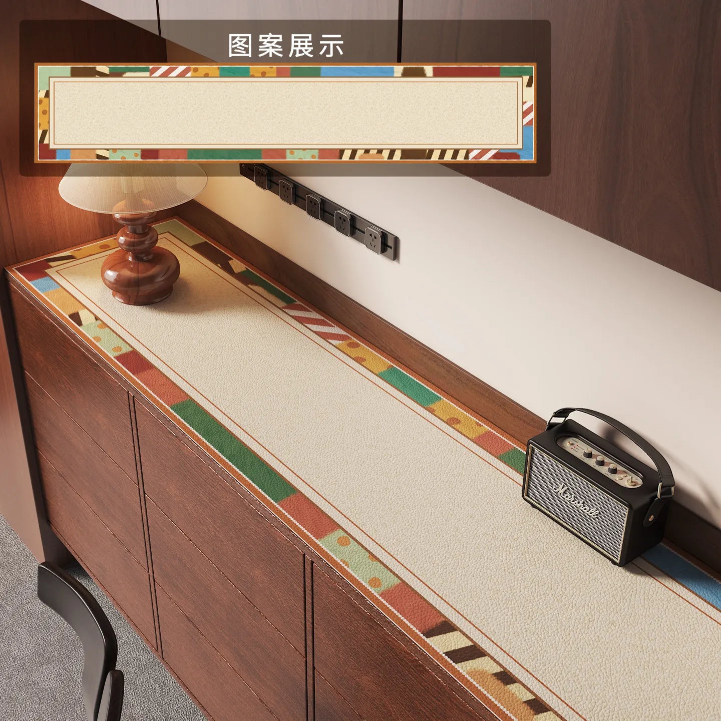 Vintage cartoon-inspired cabinet mat protector featuring colorful borders, placed on a wooden TV stand, with a lamp and speaker beside it.
