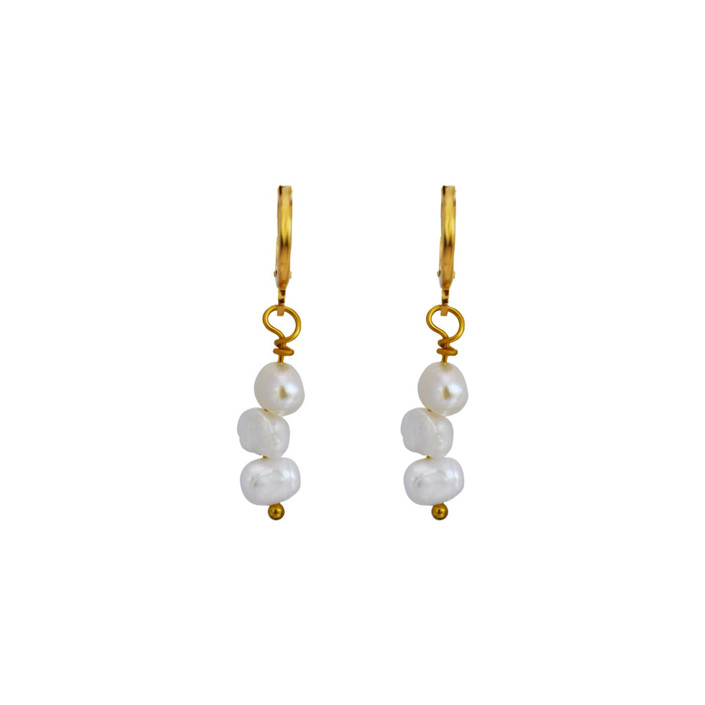 Triple irregular white freshwater pearl earrings with gold-plated brass huggies, each hanging less than an inch.